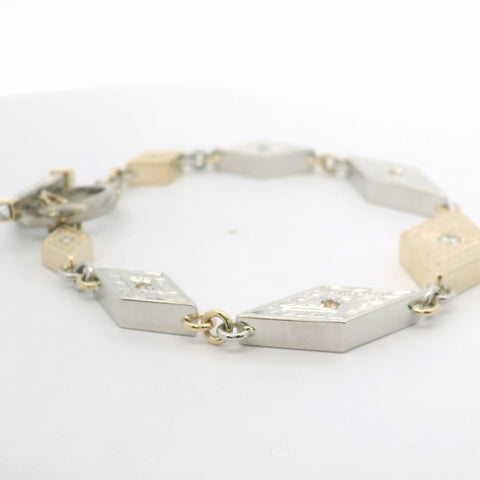 YELLOW GOLD AND PLATINUM REVERSIBLE DIAMOND MOKUME BRACELET WITH TOGGLE CLASP