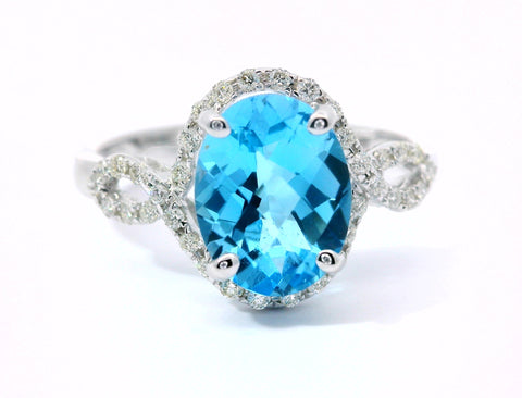 14KT WHITE GOLD BLUE TOPAZ RING 200-04240
