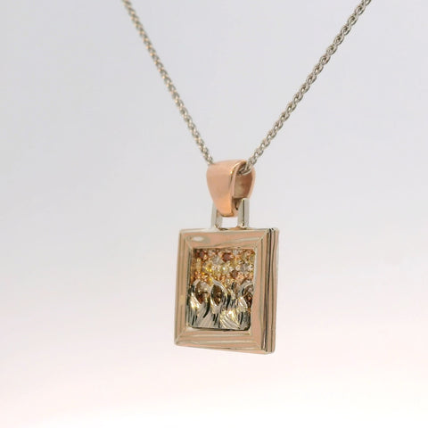 rose gold and silver pendant from the front view