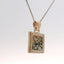 close-up of the rose gold and silver pendant