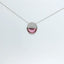 Necklace with a pink gemstone pendant viewed from the front