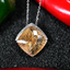 21.14CT RUTILATED QUARTZ AND DIAMOND PENDANT