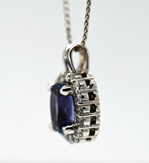 3.89CT NATURAL TANZANITE AND DIAMOND PENDANT